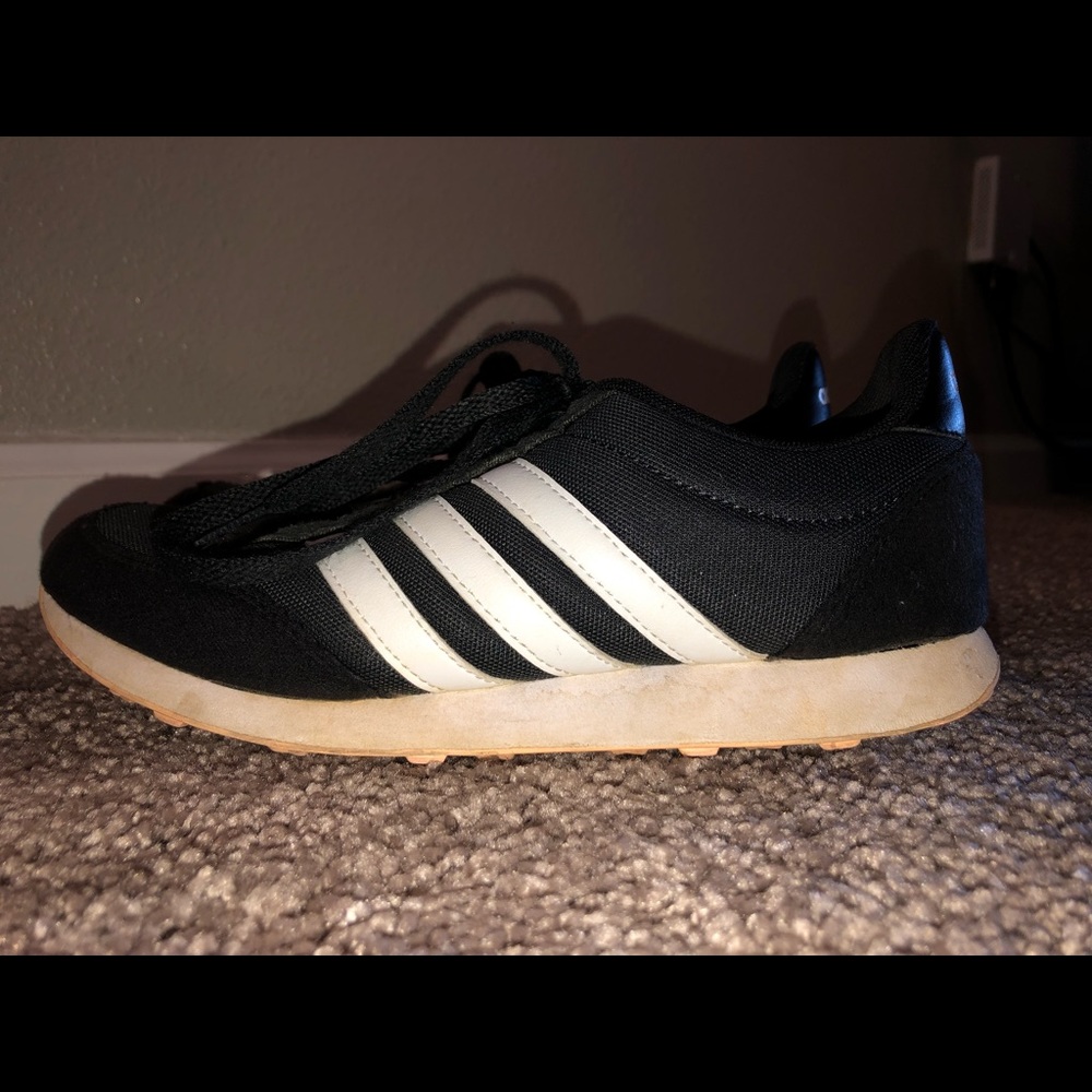 Black adidas with white stripes size 7